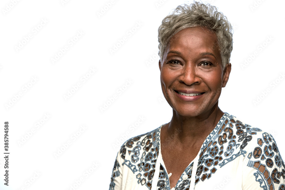 Portrait of older black woman looking at camera with smile Portrait of older black woman looking at camera with smile