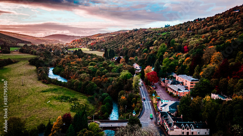 Landscape view for a Scottish town in autumn with amazing colorfull trees