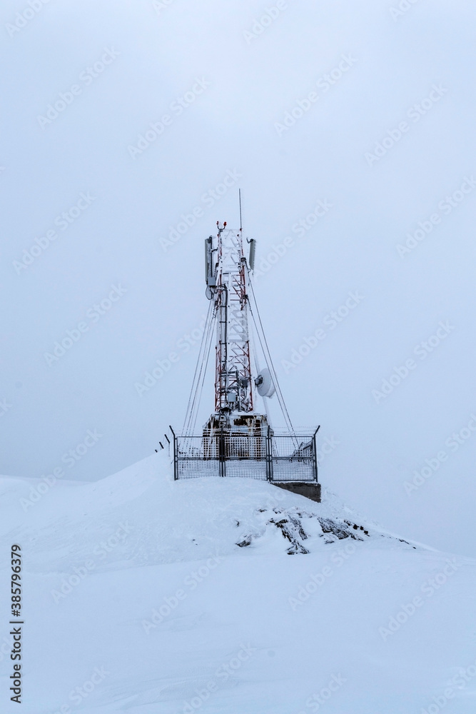 Balea lake, Transfagarasan, radio station surrounded by snow. Balea lake, Transfagarasan, radio station surrounded by snow.