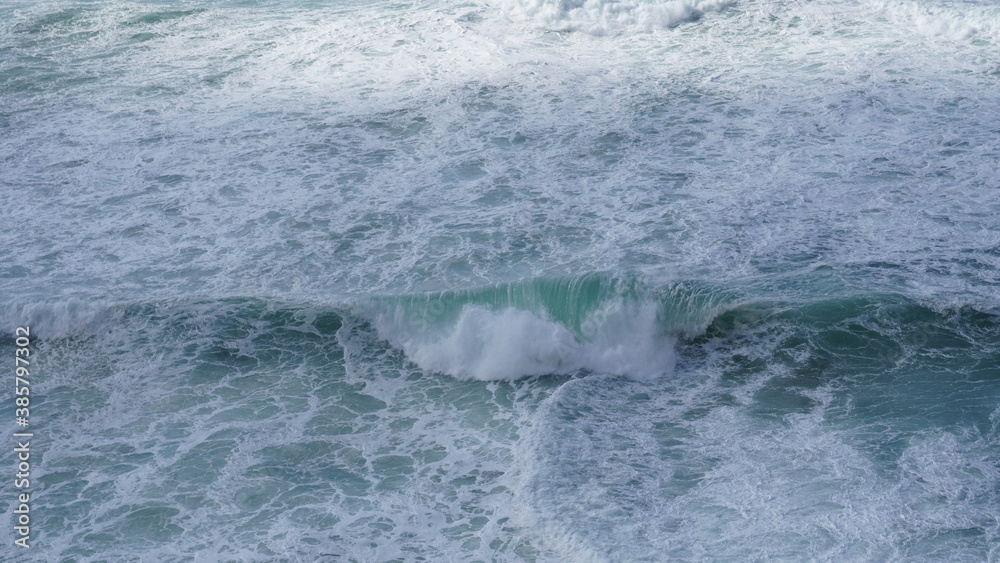 Wave in the middle of stormy sea foam Wave in the middle of stormy sea foam