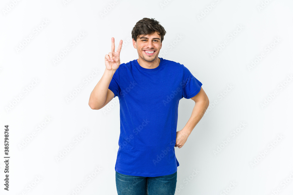 Young cool man showing number two with fingers. Young cool man showing number two with fingers.