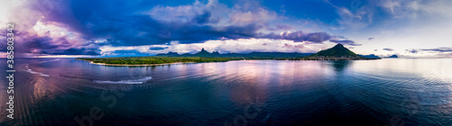 Mauritius, Black River, Flic-en-Flac, Helicopter panorama of Indian Ocean at dusk with island in background photo