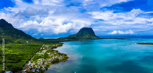 Mauritius, Black River, Tamarin, Helicopter view of coastal village with Le Morne Brabant mountain in background photo