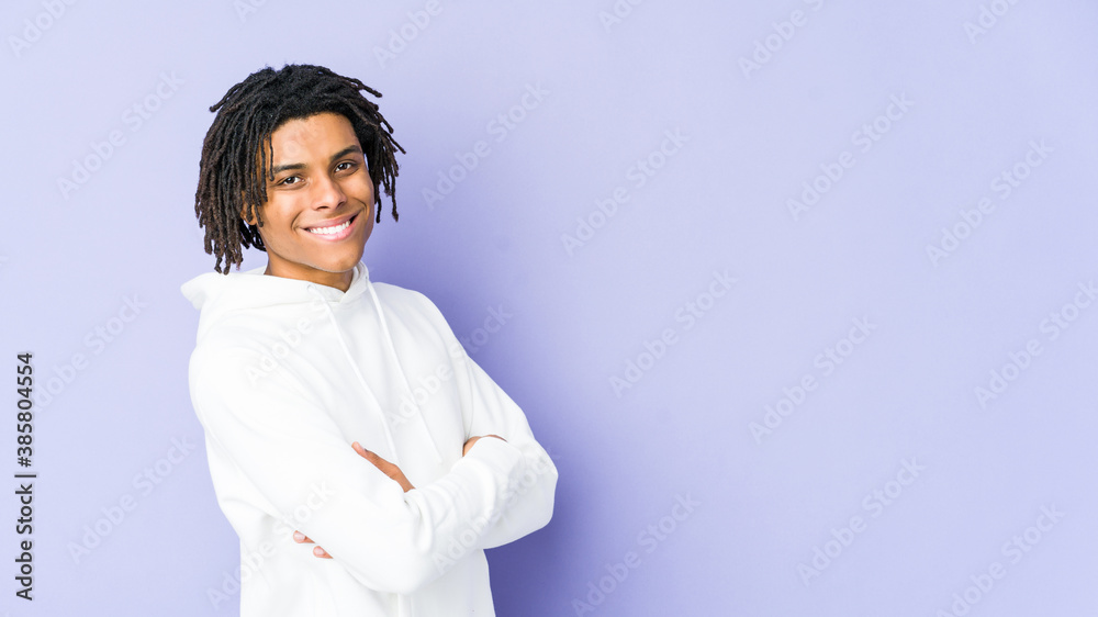 Young african american rasta man happy, smiling and cheerful. Young african american rasta man happy, smiling and cheerful.