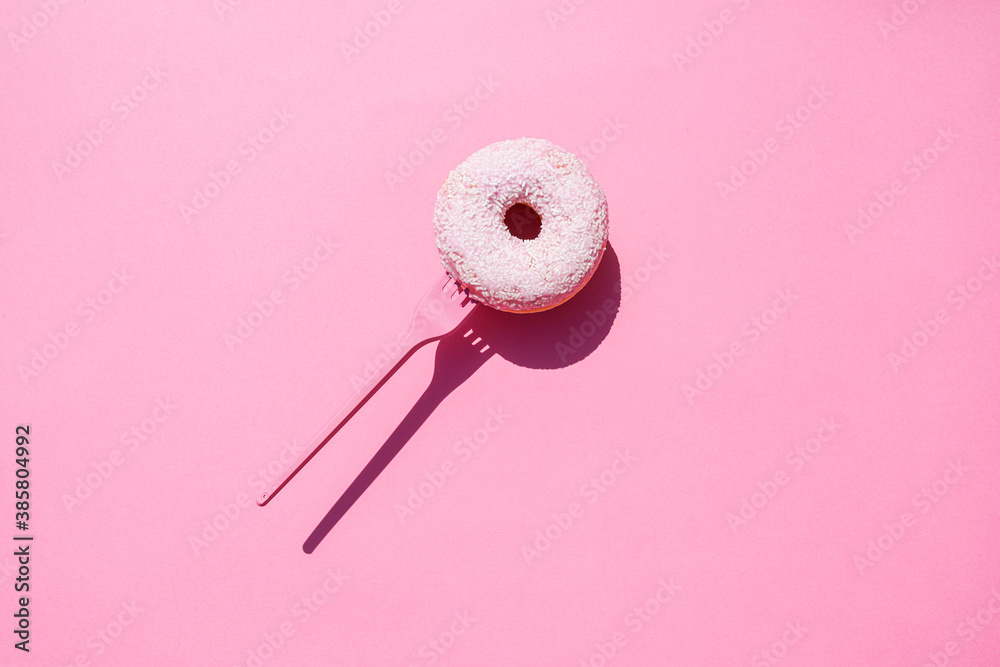 Studio shot ofÔøΩfork with sweet doughnut