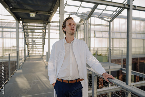Wallpaper Mural Confident scientist standing on a bridge Torontodigital.ca