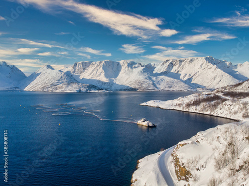 Aerial view of a fish farm in the fjords, Finnmark, Norway photo