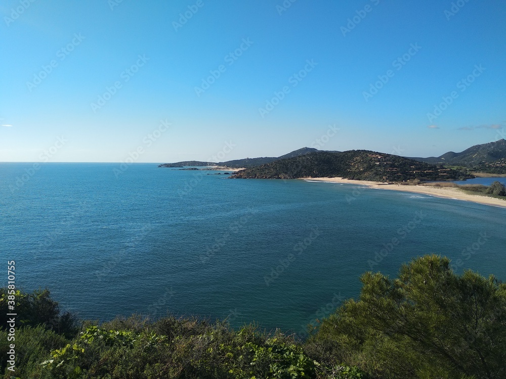 Fototapeta premium Mediterranean seascape, coastline and turquoise water from Chia tower in Sardinia, Italy 