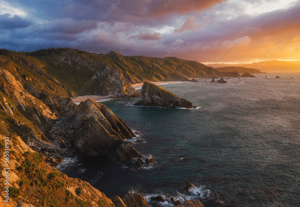 High angle view of rocky coastline during sunset High angle view of rocky coastline during sunset
