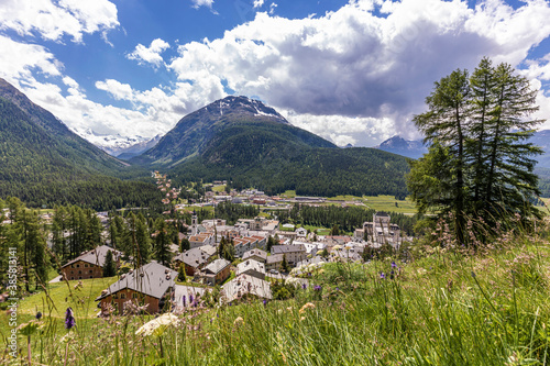 Switzerland, Canton of Grisons, Pontresina, Town in Val Bernina on sunny summer day photo