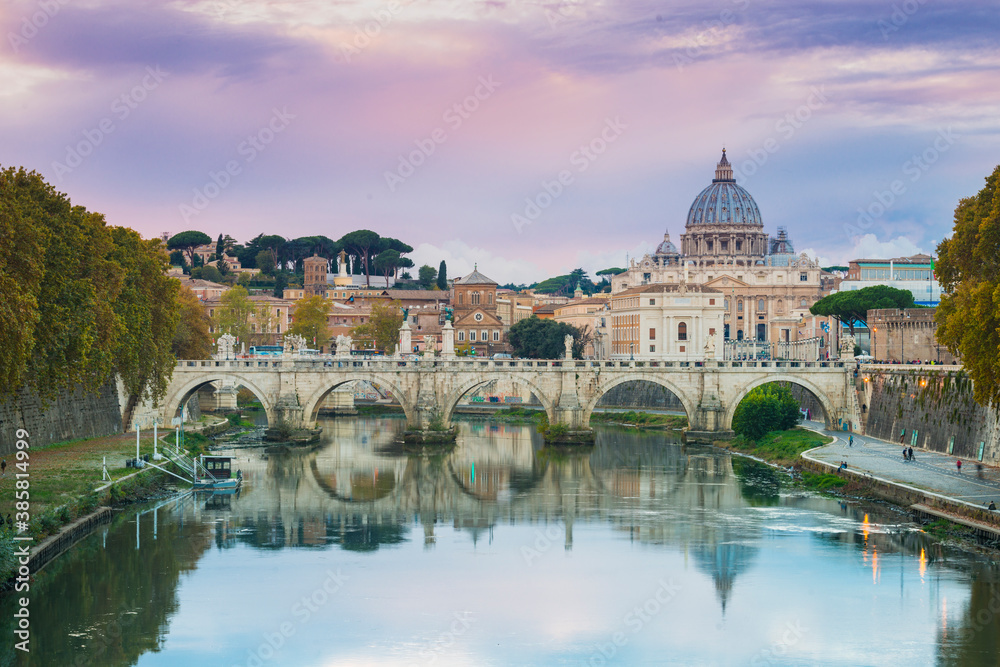 View of Saint Peter's Basilica and arch bridge against cloudy sky View of Saint Peter's Basilica and arch bridge against cloudy sky