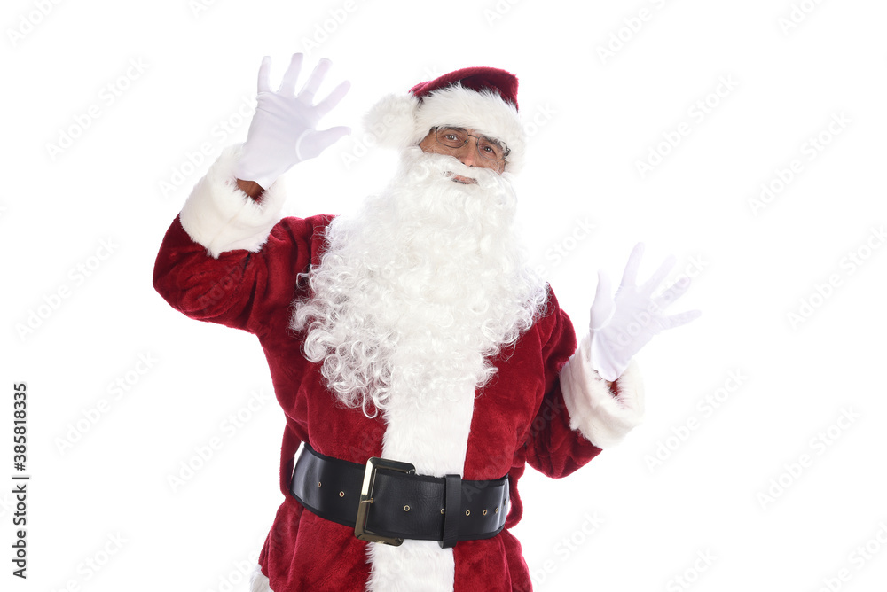 Senior man in traditional Santa Claus costume with hands in the air acting surprised or shocked. Isolated on white. Senior man in traditional Santa Claus costume with hands in the air acting surprised or shocked. Isolated on white.