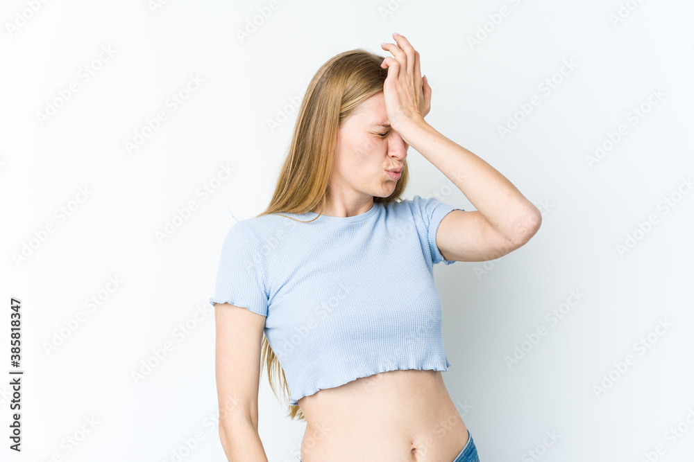 Young blonde woman isolated on white background forgetting something, slapping forehead with palm and closing eyes. Young blonde woman isolated on white background forgetting something, slapping forehead with palm and closing eyes.