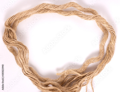 close-up of brown strong rope, frame view isolated