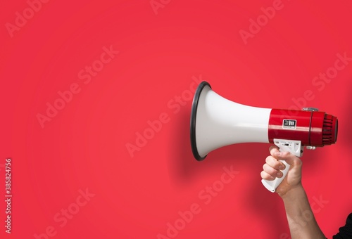 Human hand hold the classic megaphone