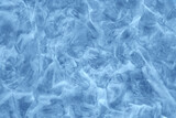 Blue ice background. Frozen water.