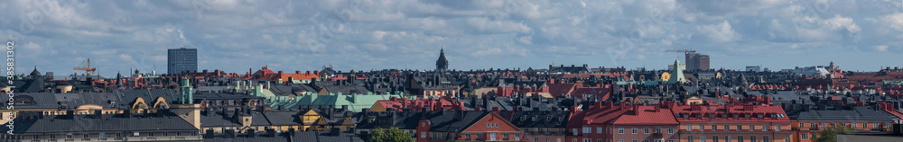 Skyline over roofs of the district Vasa Stan in Stockholm a sunny morning.