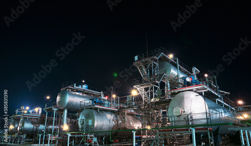 Industrial equipment at an oil refinery station.
Oil and gas industry, oil refining and refining