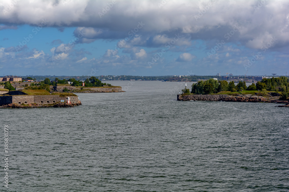 View from cruise ferry heading to Helsinki and approaching the Suomenlinna (fin. Castle of Finland) fortress (Sveaborg - Castle of the Swedes, swed), Finland. It consists of eight islands.