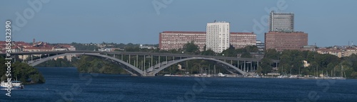 Panorama over the bay Riddarfjärden with the bridge Västerbron to the district Kungsholmen a sunny spring morning
