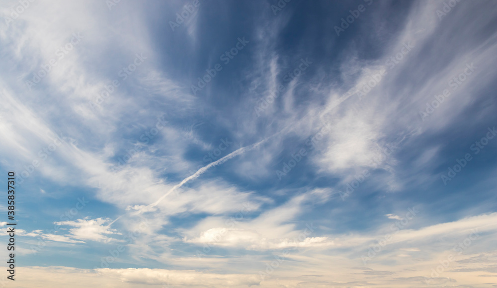 Plumose clouds in the blue sky, nature background Plumose clouds in the blue sky, nature background