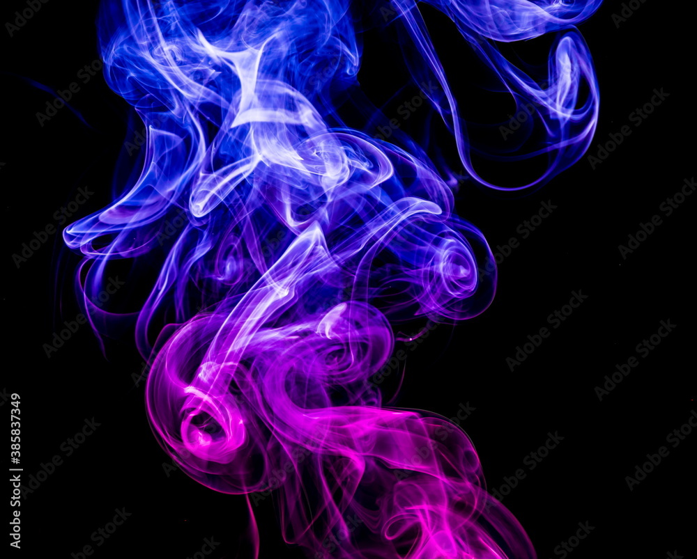 Obraz premium Colored smoke on black background