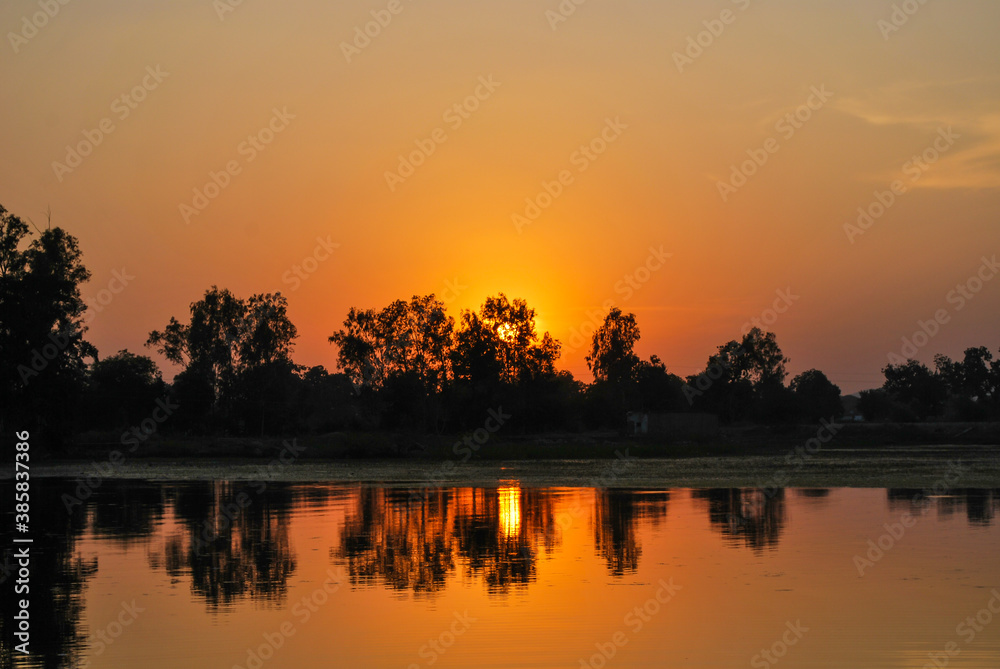 Beautiful Sunset in The Shivsagar Lake - Khajuraho, Madhya Pradesh, India.
