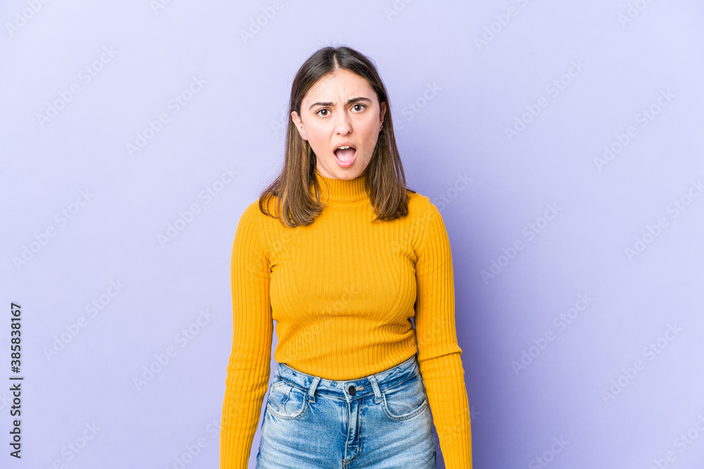 Young caucasian woman shouting very angry, rage concept, frustrated. Young caucasian woman shouting very angry, rage concept, frustrated.