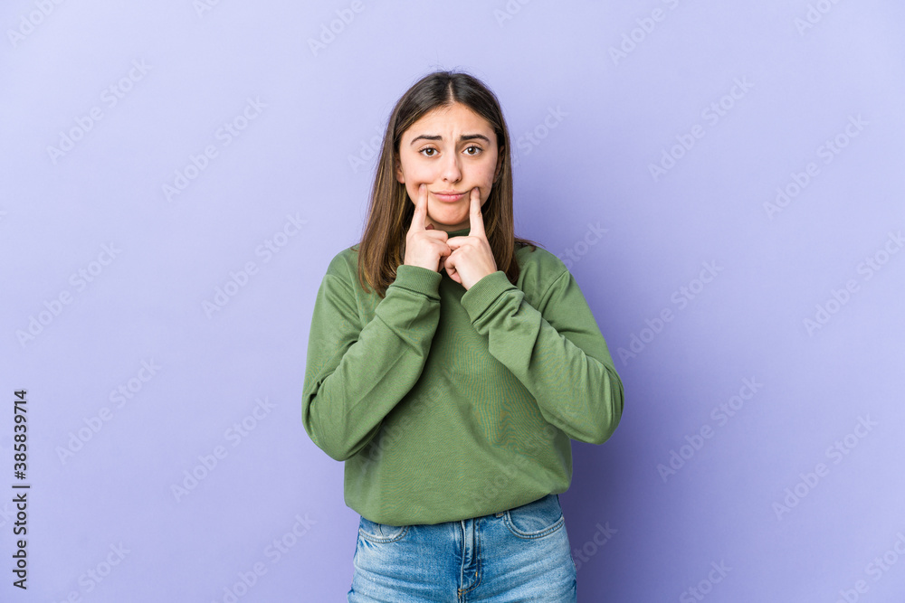 Young caucasian woman doubting between two options. Young caucasian woman doubting between two options.