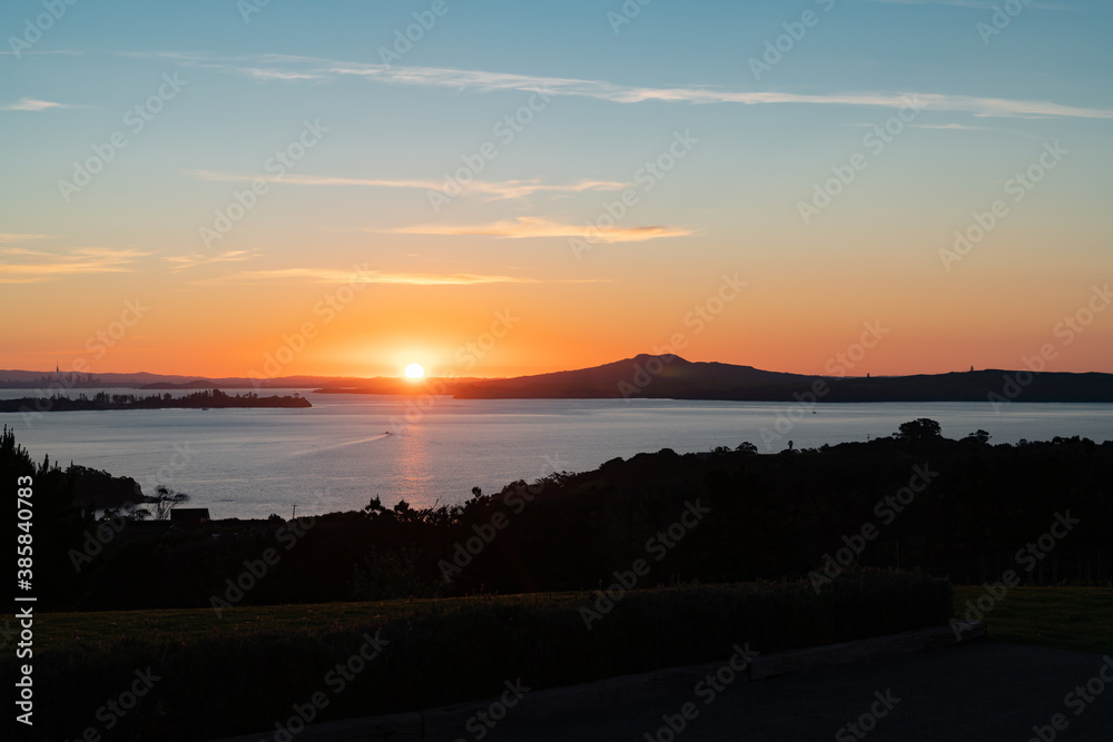 Glorious sunset across Auckland's Waitemata Harbour from Waiheke Island Glorious sunset across Auckland's Waitemata Harbour from Waiheke Island