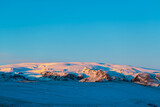 Iceland's incredible mountain landscape in winter. Mountains in the snow. Large spaces. The beauty of winter nature