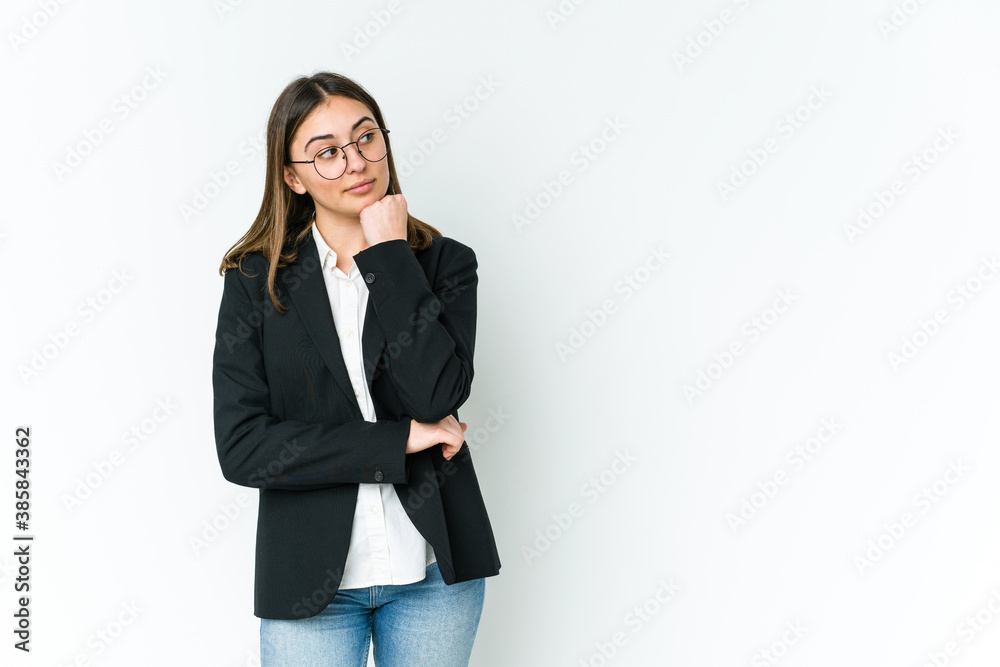 Young caucasian business woman who feels sad and pensive, looking at copy space. Young caucasian business woman who feels sad and pensive, looking at copy space.