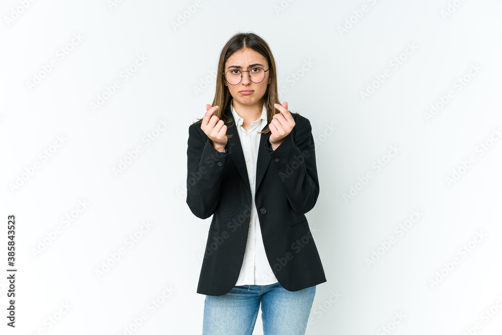 Young caucasian business woman showing that she has no money. Young caucasian business woman showing that she has no money.