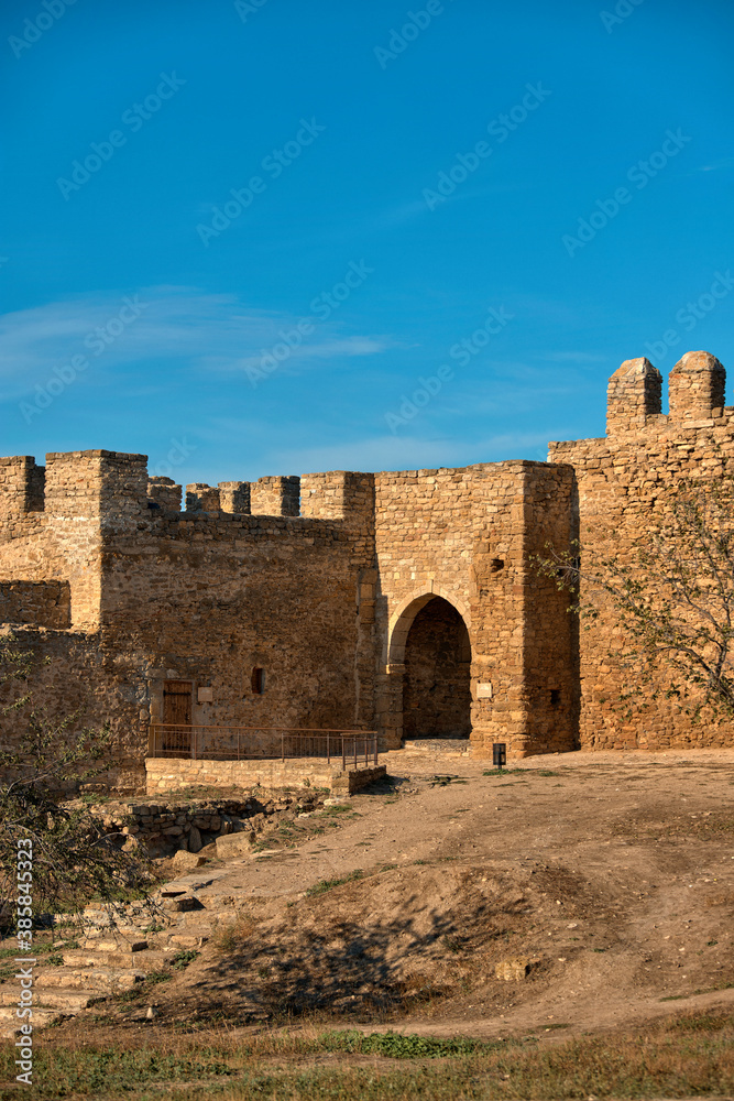 Walls and towers of an ancient fortress, In Belgorod-Dnestrovsky, Akkerman, against the blue sky