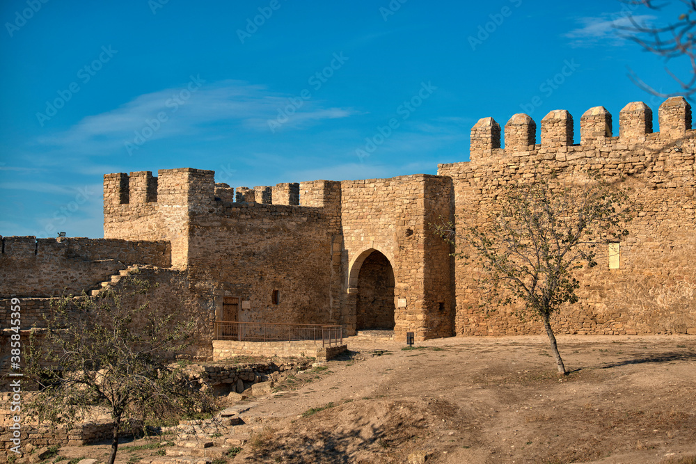 Walls and towers of an ancient fortress, In Belgorod-Dnestrovsky, Akkerman, against the blue sky