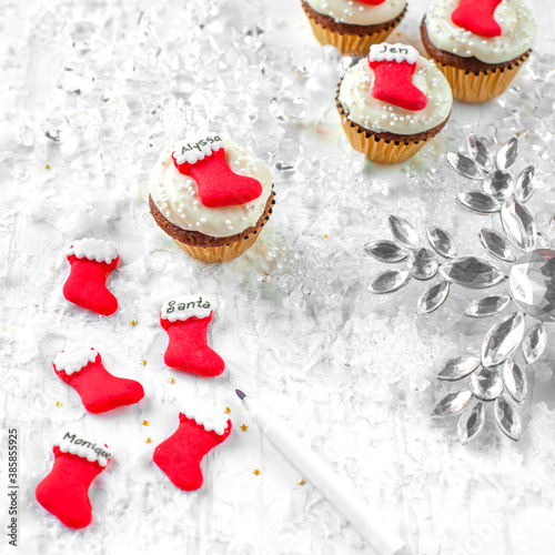 Mini Holiday Christmas Cupcakes with Decorations with Silver Accents and Snow © mmjohnson
