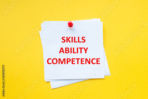 skills ability competence. Word on white sticker with yellow background