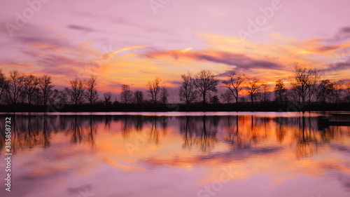 sunset over the lake © frostklamm