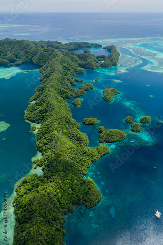 Aerial shot of tidal channel, coral reef and islands in Palau, Micronesia © Lightning Strike Pro