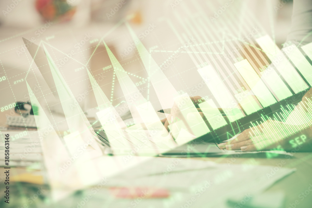 Double exposure of woman hands typing on computer and forex chart hologram drawing. Stock market invest concept. Double exposure of woman hands typing on computer and forex chart hologram drawing. Stock market invest concept.