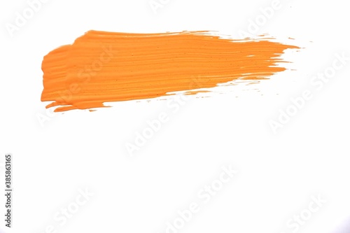 Paint strokes orange color isolated on white background. Symbol or logo of art company. 
