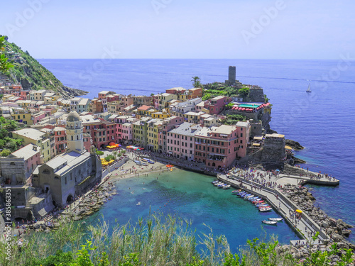 Hilltop view of Vernazza's village and harbour, in the Cinque Terre, Italy