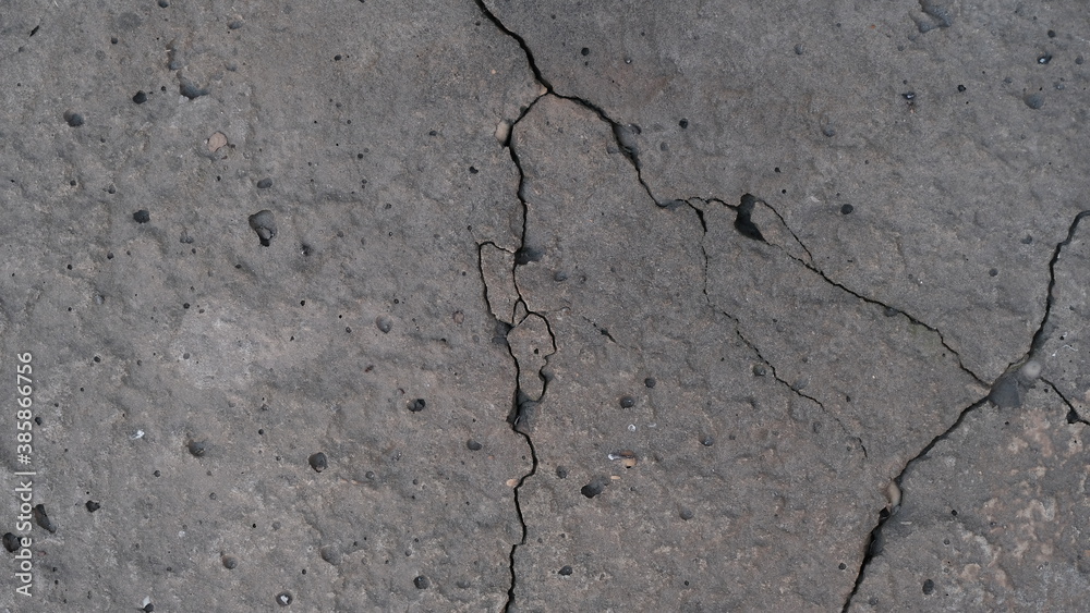 Fototapeta premium Crack on the concrete surface. Abstract background for design.