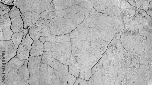 Crack on the concrete surface. Abstract background for design.