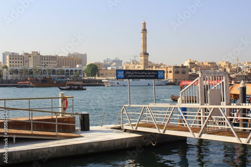 Dubai, UAE - October 13th 2019: Deira Old Souq Water Taxi Station in Dubai - Old Arabian Souq Boat on Dubai Creek River