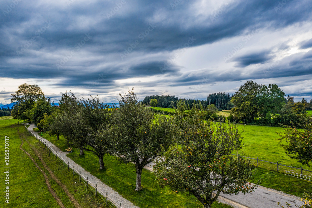 dark clouds over the country road dark clouds over the country road