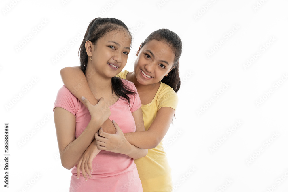 portrait happy from two young girl isolated in white background portrait happy from two young girl isolated in white background