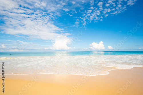 Nature and travel. Beach sea and blue sky with clouds background.