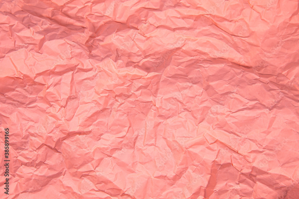 Close up of pink wrinkle crumpled old with paper page texture rough background. crease grunge parchment pattern vintage design Close up of pink wrinkle crumpled old with paper page texture rough background. crease grunge parchment pattern vintage design