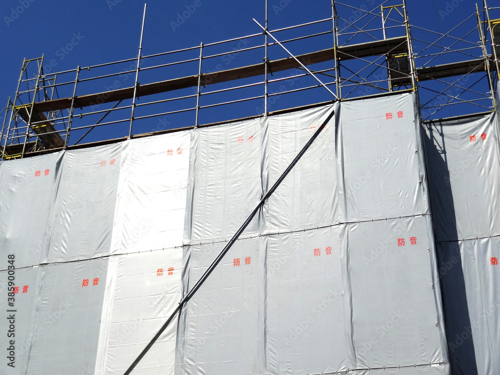 Φωτογραφία ビル建築工事現場の防音シート